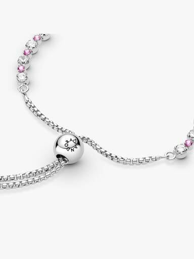 Rhodium plated sterling silver slider bracelet with clear cubic zirconia and synthetic pink sapphire