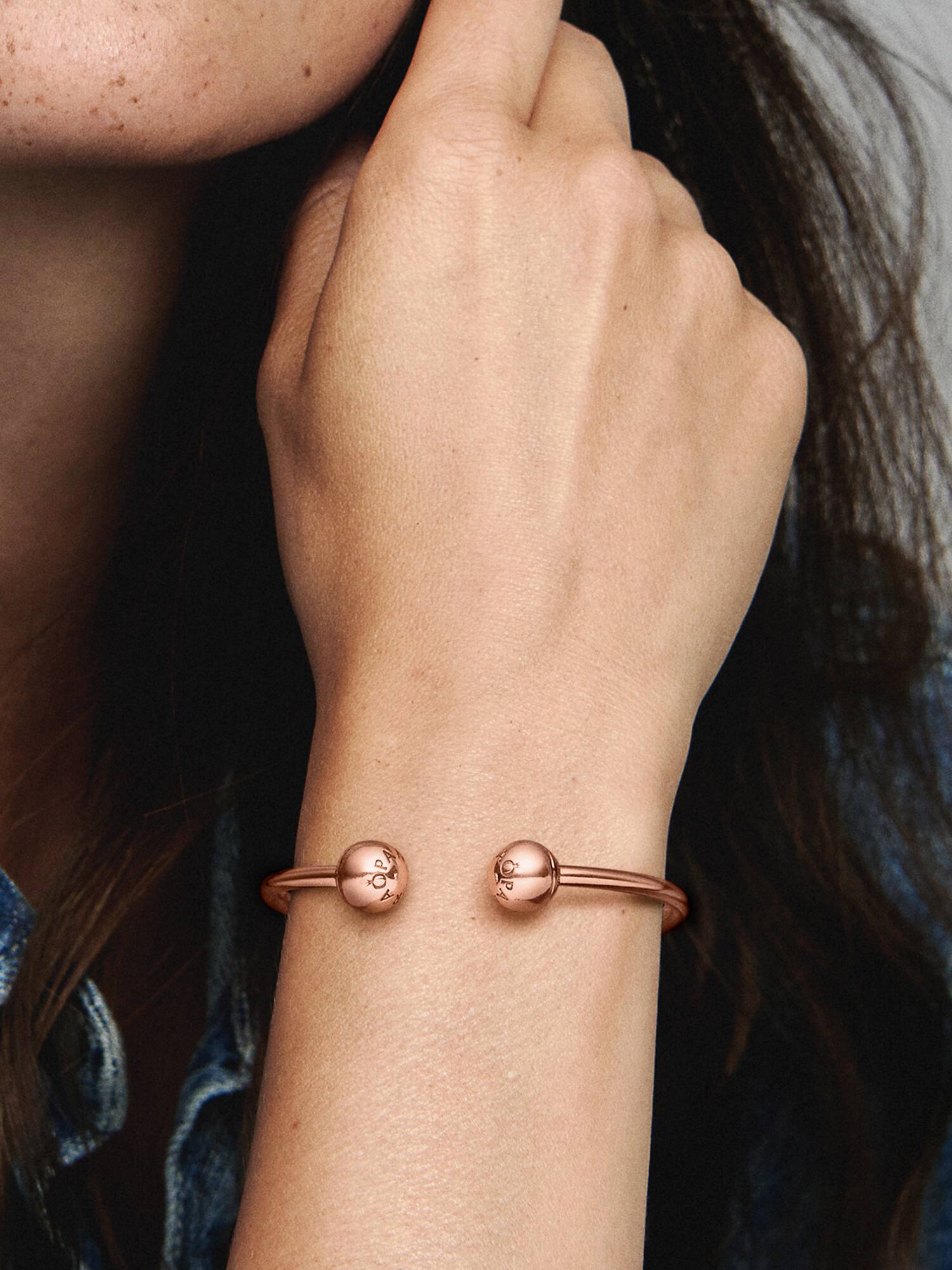 14k Rose gold-plated open bangle with silicone stoppers and interchangeable end caps