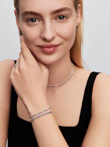 Sterling silver tennis bracelet with yellow, blue, phlox pink, green crystal, pink, clear and fancy pink cubic zirconia