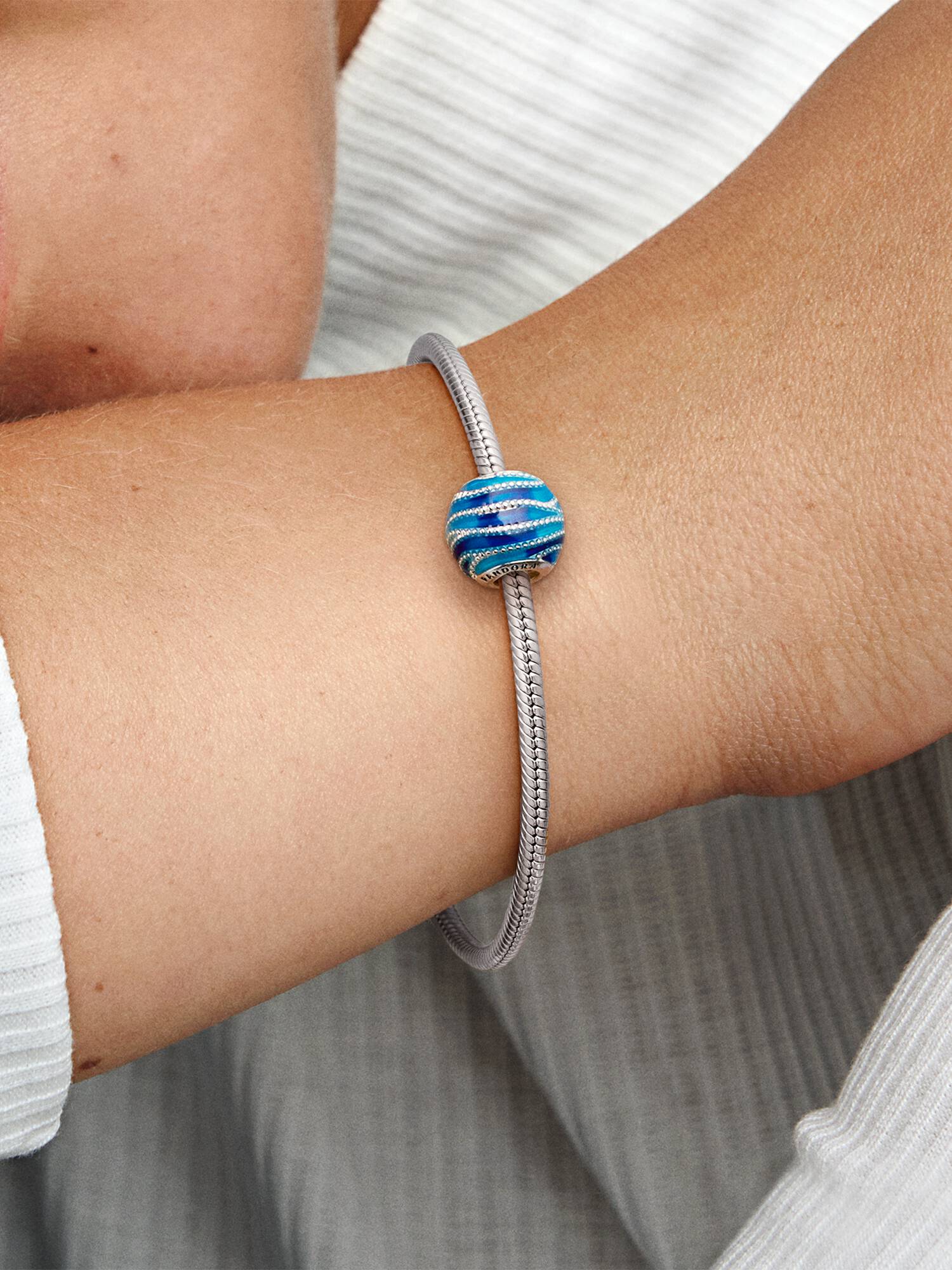 Water silver charm with mixed blue enamel colours