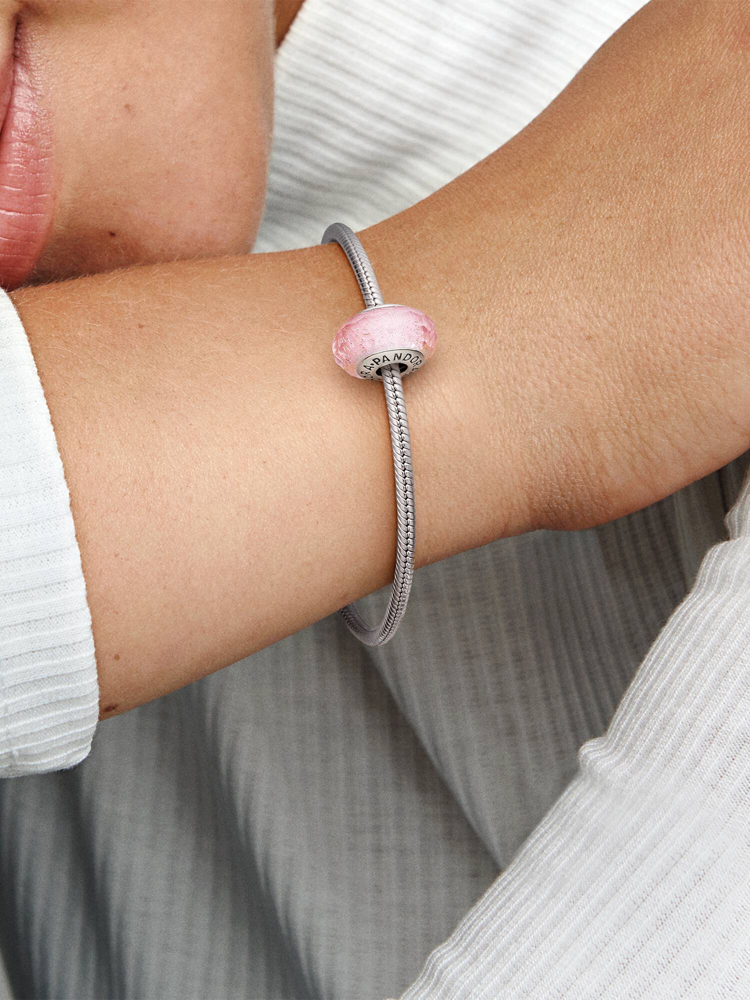 Abstract silver charm with faceted iridescent pink Murano glass