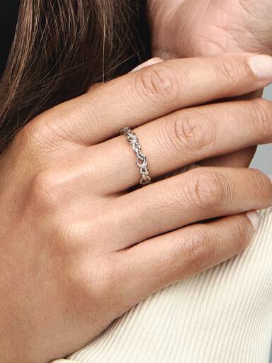 Knotted hearts silver ring