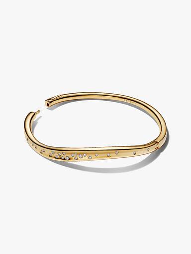 14k gold-plated bangle with clear cubic zirconia