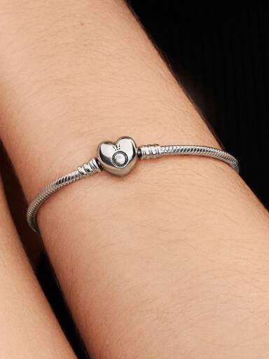 Silver bracelet with heart-shaped clasp