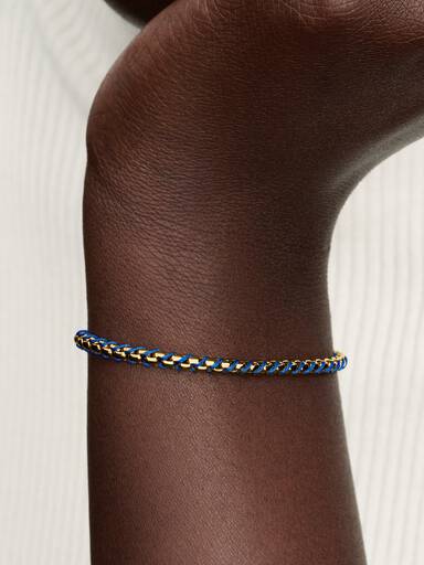 Braided 14k gold-plated box chain bracelet with blue textile cord