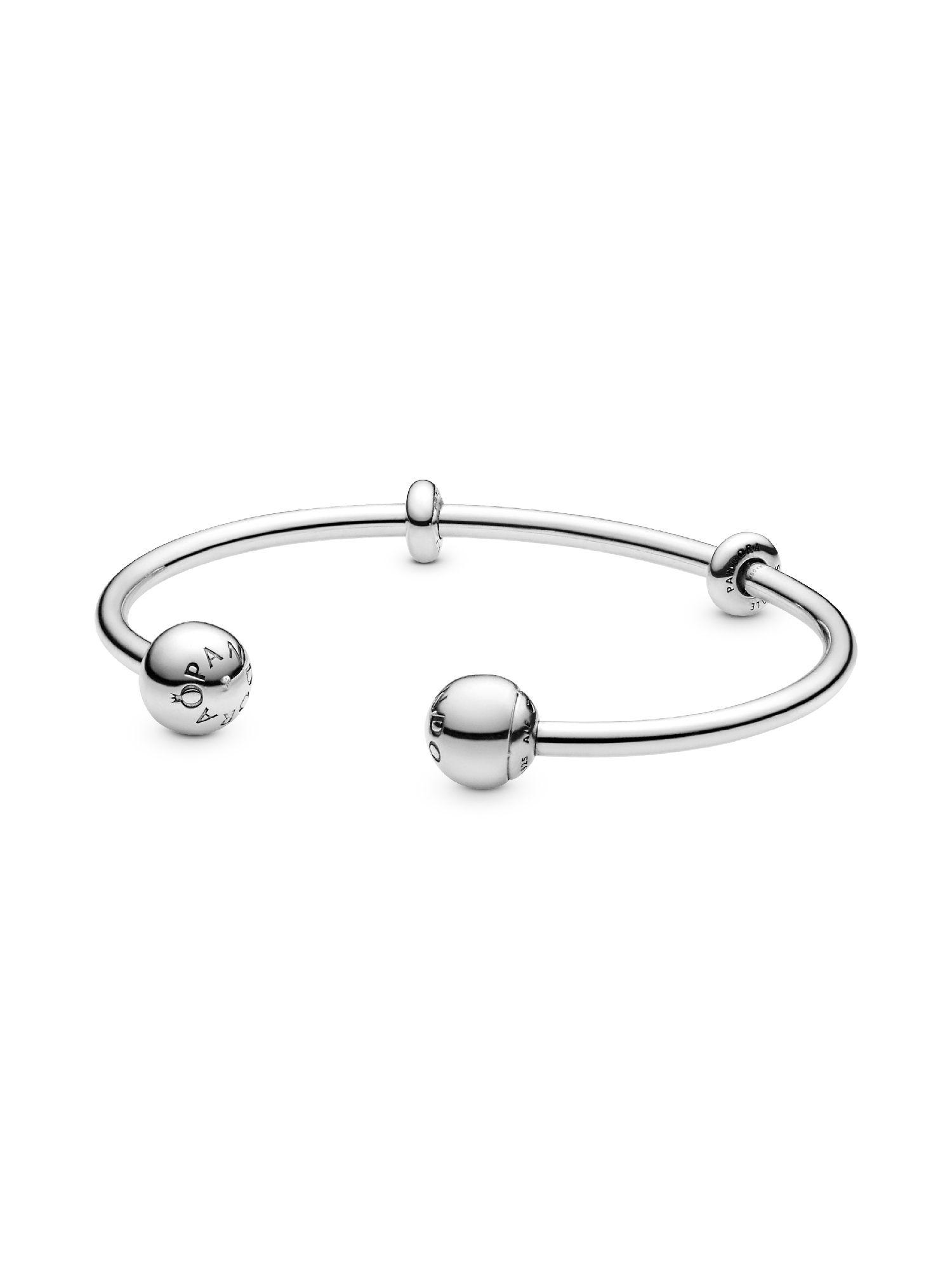 Silver open bangle with silicone stoppers and interchangeable end caps