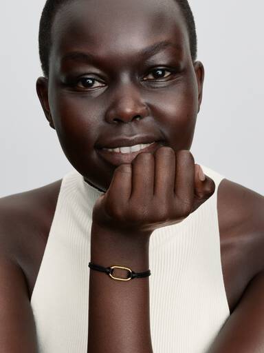14k gold-plated bracelet with black cord