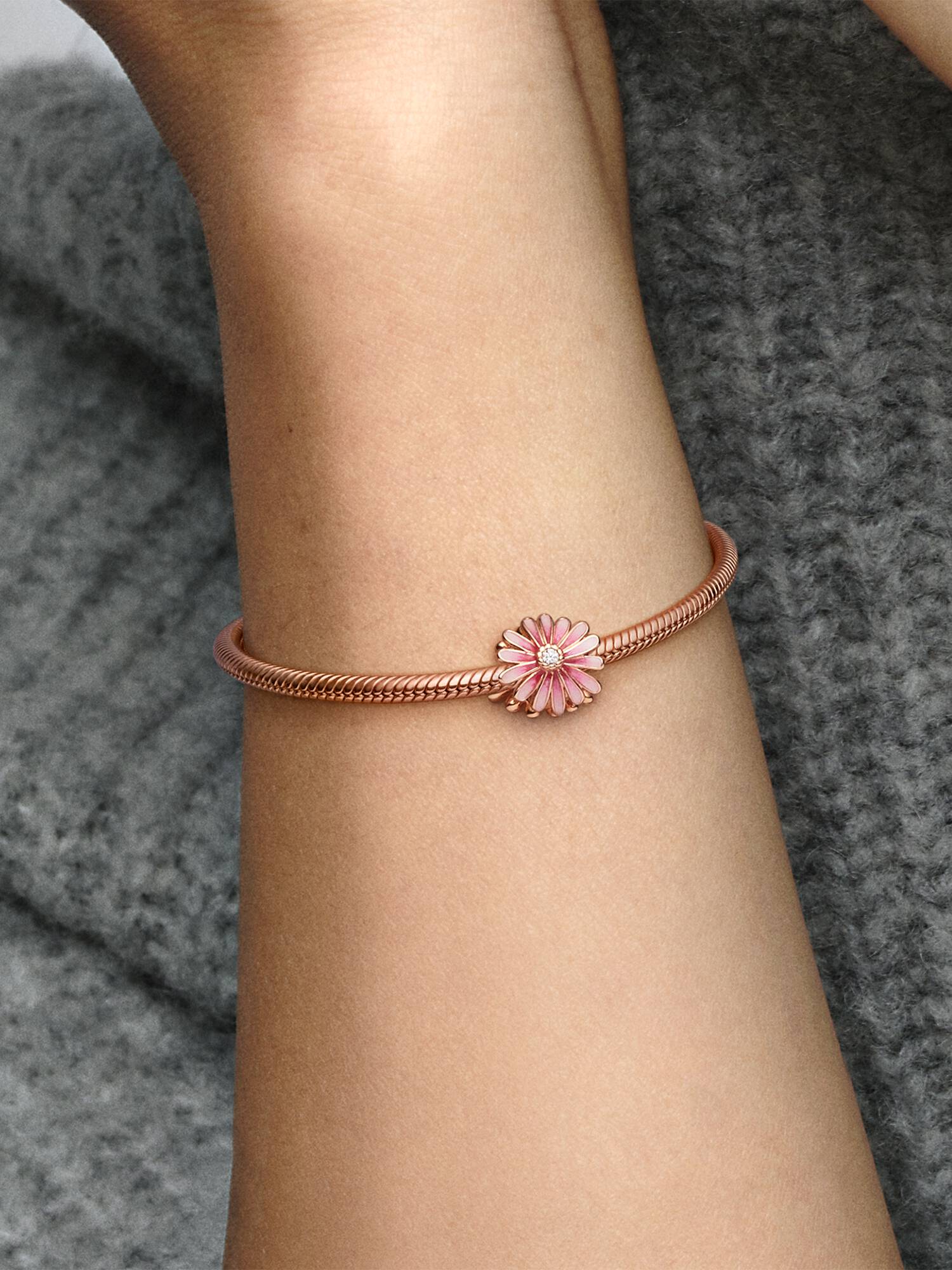 Daisy 14k rose gold-plated charm with clear cubic zirconia and shaded pink enamel