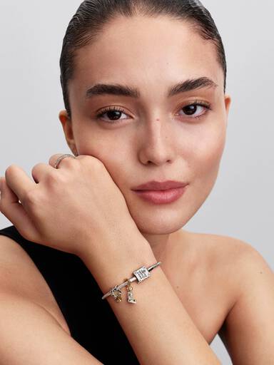 Disney Tiana sterling silver and 14k gold-plated charm with 0.012 ct TW G-I VS+ round brilliant very good cut lab-grown diamond