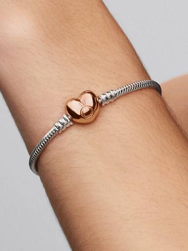 Silver bracelet with heart-shaped 14k rose gold-plated clasp