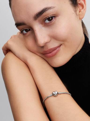Silver bracelet with heart-shaped clasp