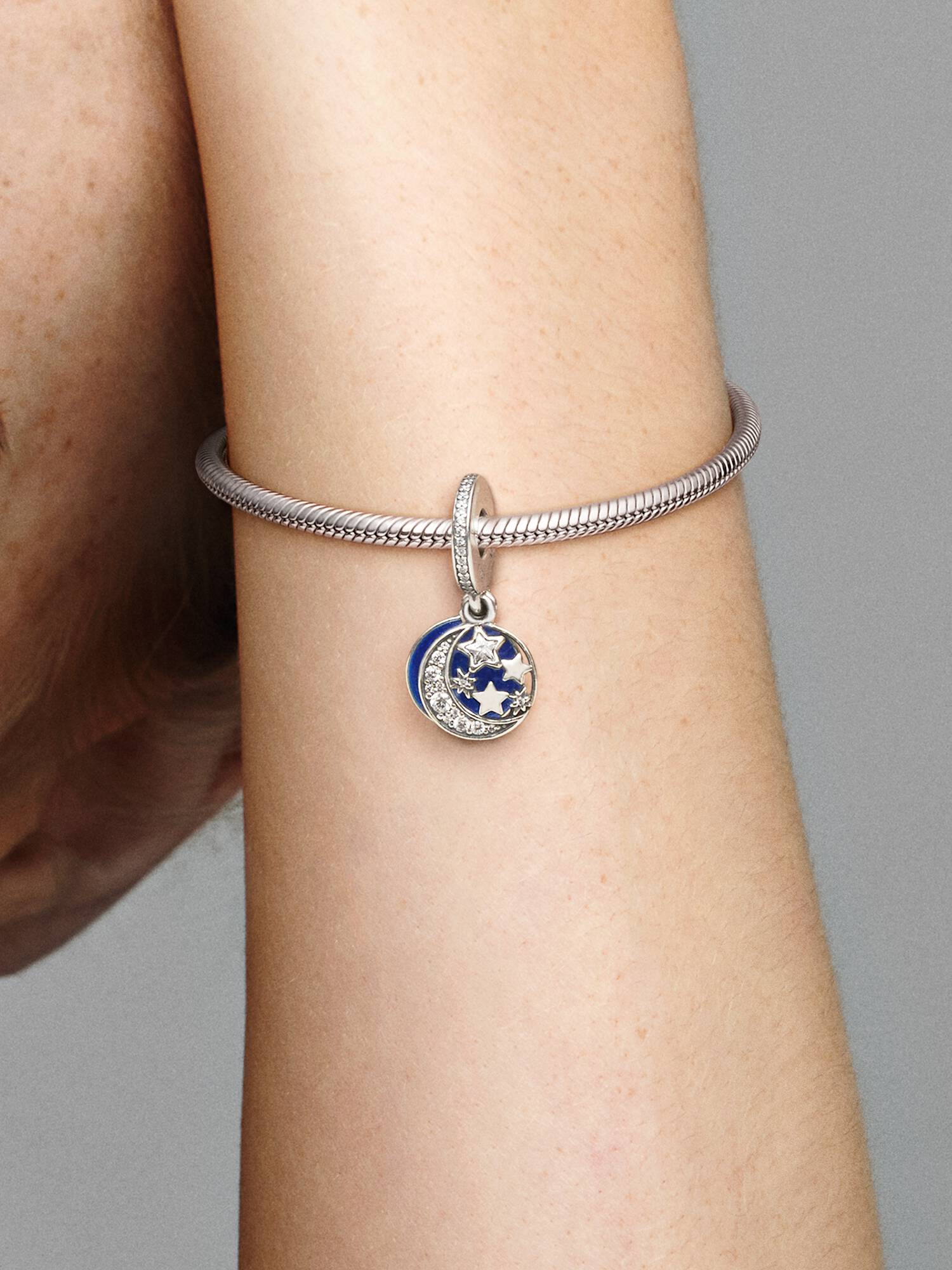 Moon and star silver dangle with clear cubic zirconia and blue enamel